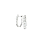 18ct white gold diamond huggie earrings featuring a hinged “U”-shape design with claw-set diamonds along the front and inside back.