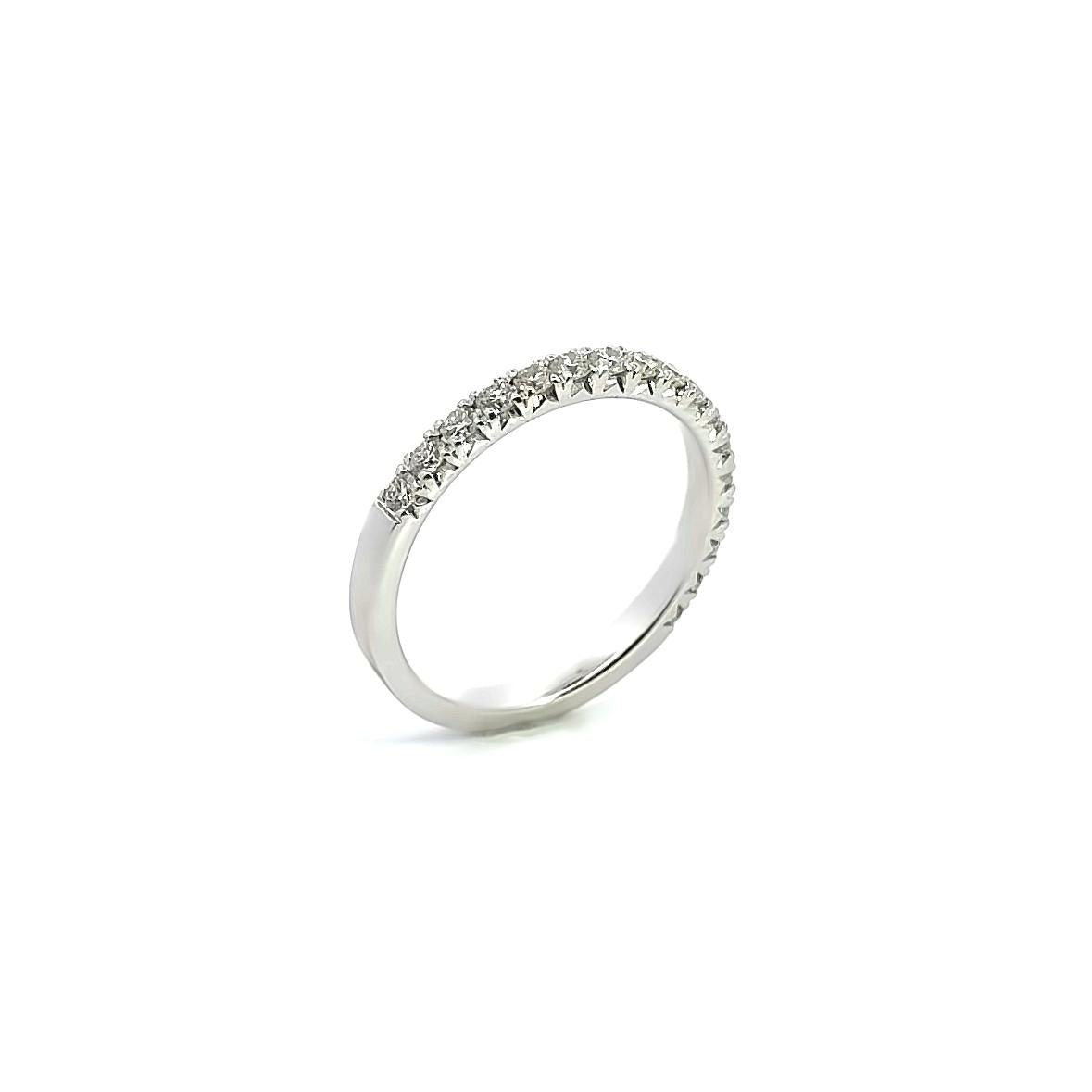 18ct white gold low-profile wedding ring featuring seventeen round brilliant cut diamonds totalling 0.45ct in a claw setting across the top.