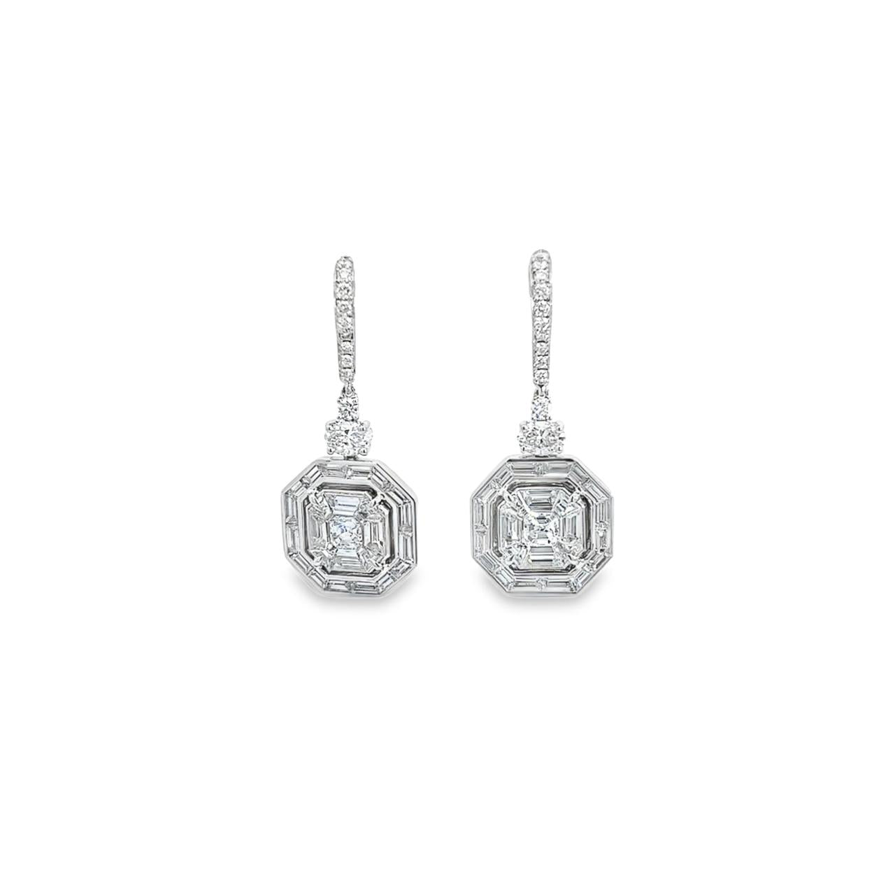 18ct white gold diamond octagonal drop earrings featuring curved bead-set bars, articulated claw-set drops, and octagonal “invisible” cluster settings with round, oval, baguette and asscher cut diamonds totalling 3.35ct G VVS–SI.