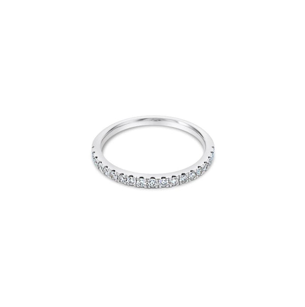 Platinum diamond wedding ring featuring seventeen claw-set round brilliant cut diamonds across the band.