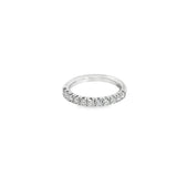Platinum wedding ring featuring eleven round brilliant cut diamonds totalling 0.47ct in a claw setting across the top.