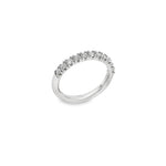 Platinum wedding ring featuring eleven round brilliant cut diamonds totalling 0.47ct in a claw setting across the top.