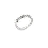 Platinum wedding ring featuring eleven round brilliant cut diamonds totalling 0.47ct in a claw setting across the top.