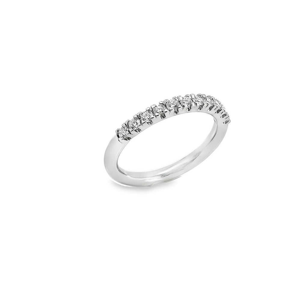 Platinum wedding ring featuring eleven claw-set round brilliant cut diamonds across the top of the band.