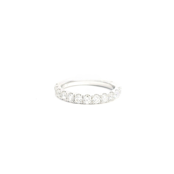 18ct white gold diamond ring featuring twelve round brilliant cut diamonds claw set in a straight row across the top, totalling 0.92ct GH/SI.