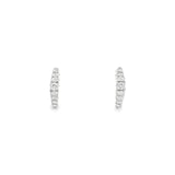 18ct white gold huggie earrings with distinctive diamond-shaped profile, featuring 16 round brilliant cut diamonds set down the front, hinged with clip catch fittings.