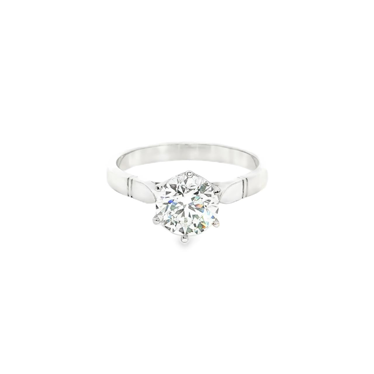 Platinum diamond solitaire ring featuring a 1.53ct round brilliant cut diamond in a six-claw setting, size Q (resizeable).