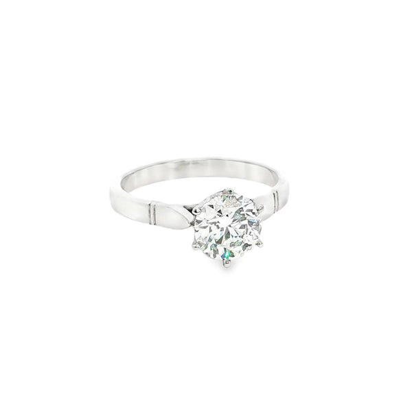 Platinum diamond solitaire ring featuring a 1.53ct round brilliant cut diamond in a six-claw setting, size Q (resizeable).
