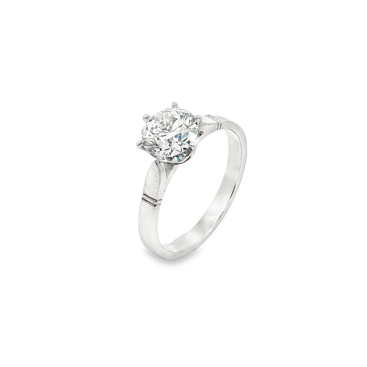 Platinum diamond solitaire ring featuring a 1.53ct round brilliant cut diamond in a six-claw setting, size Q (resizeable).