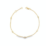 18ct yellow gold bracelet with bezel set diamond stations along fine chain