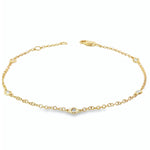 18ct yellow gold bracelet with bezel set diamond stations along fine chain