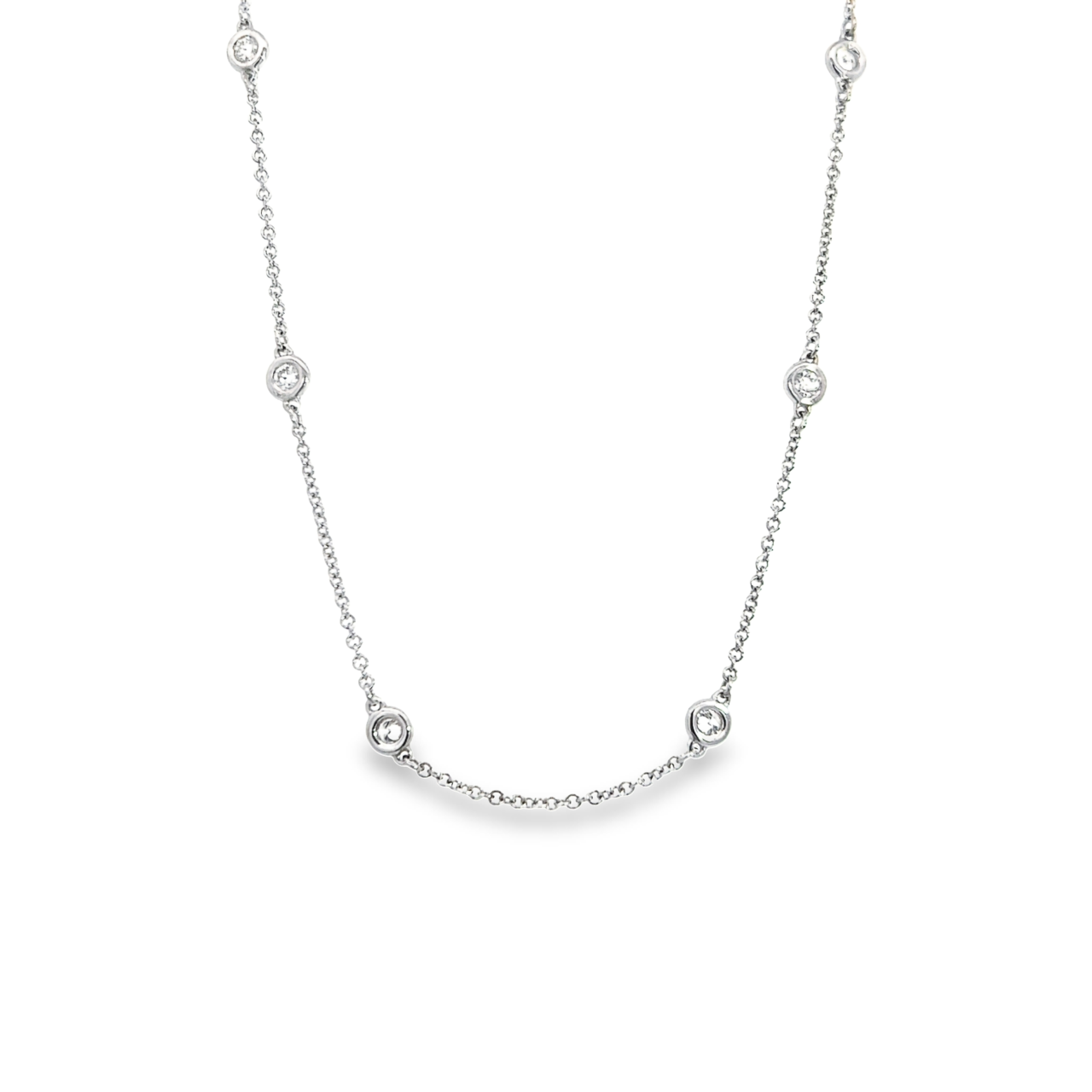 18ct white gold necklace featuring 13 bezel-set round brilliant cut diamonds spaced along a 42cm fine trace link chain.