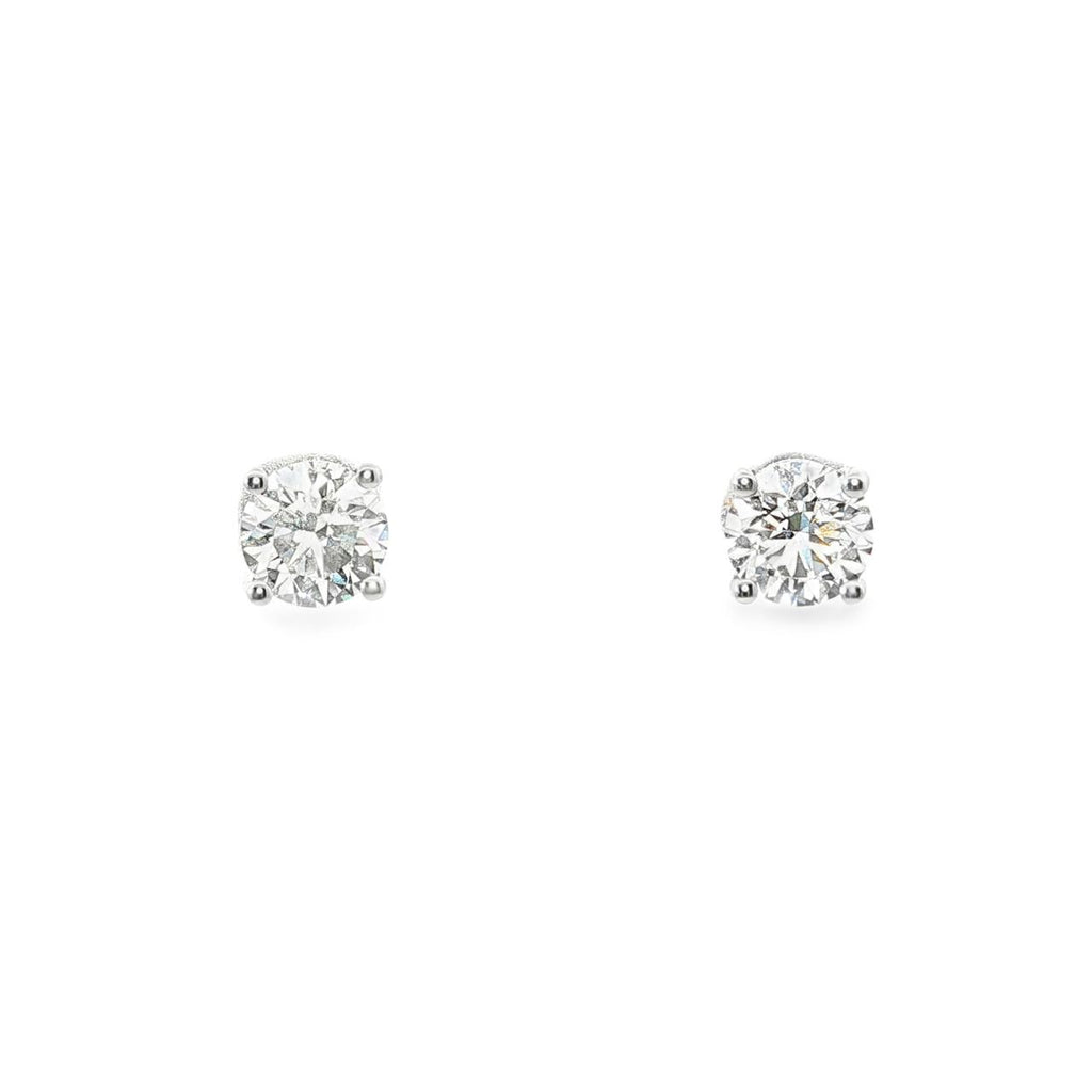 18ct white gold diamond stud earrings featuring two GIA-certified 0.50ct round brilliant cut diamonds (F/SI1) in tapered four-claw settings with post and butterfly fittings.