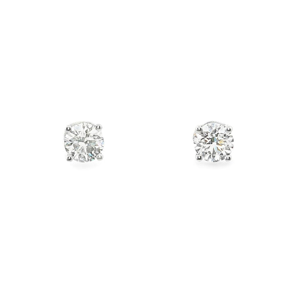 18ct white gold diamond stud earrings featuring two GIA-certified 0.50ct round brilliant cut diamonds (F/SI1) in tapered four-claw settings with post and butterfly fittings.