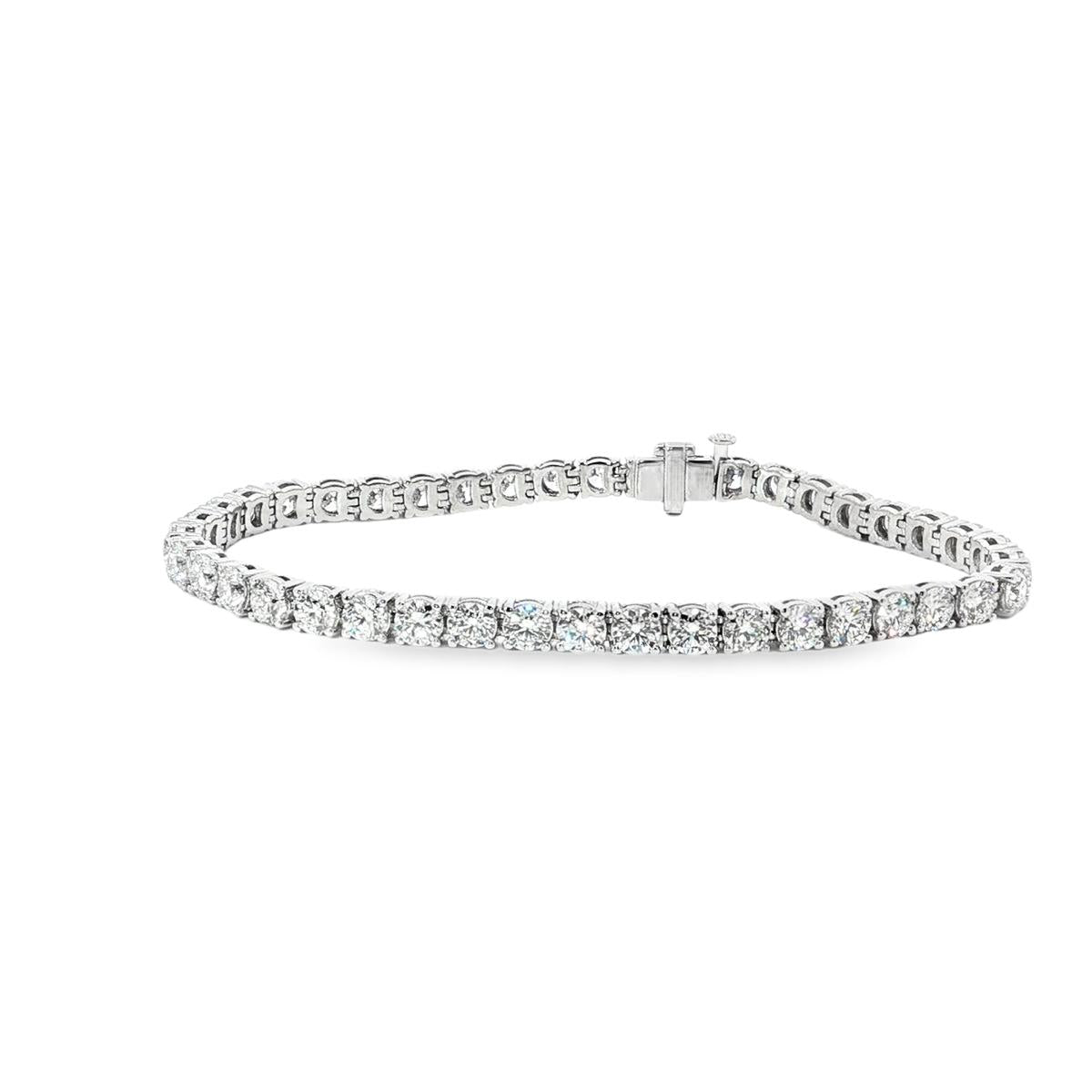 18ct white gold diamond tennis bracelet with large round brilliant cut diamonds in four claw settings
