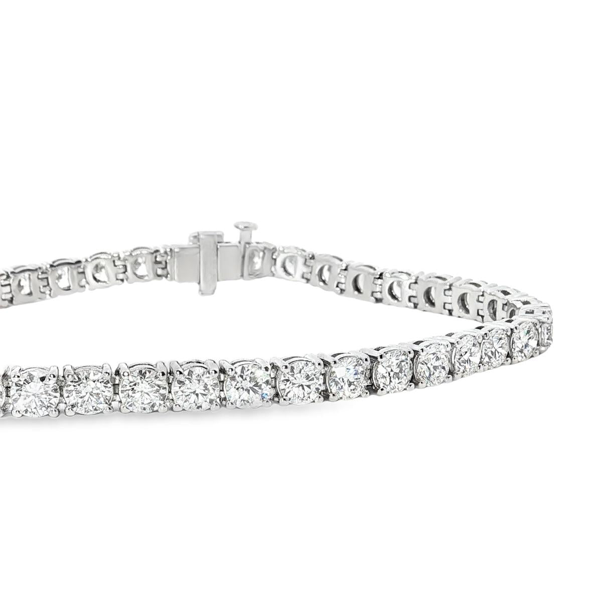 18ct white gold diamond tennis bracelet with large round brilliant cut diamonds in four claw settings