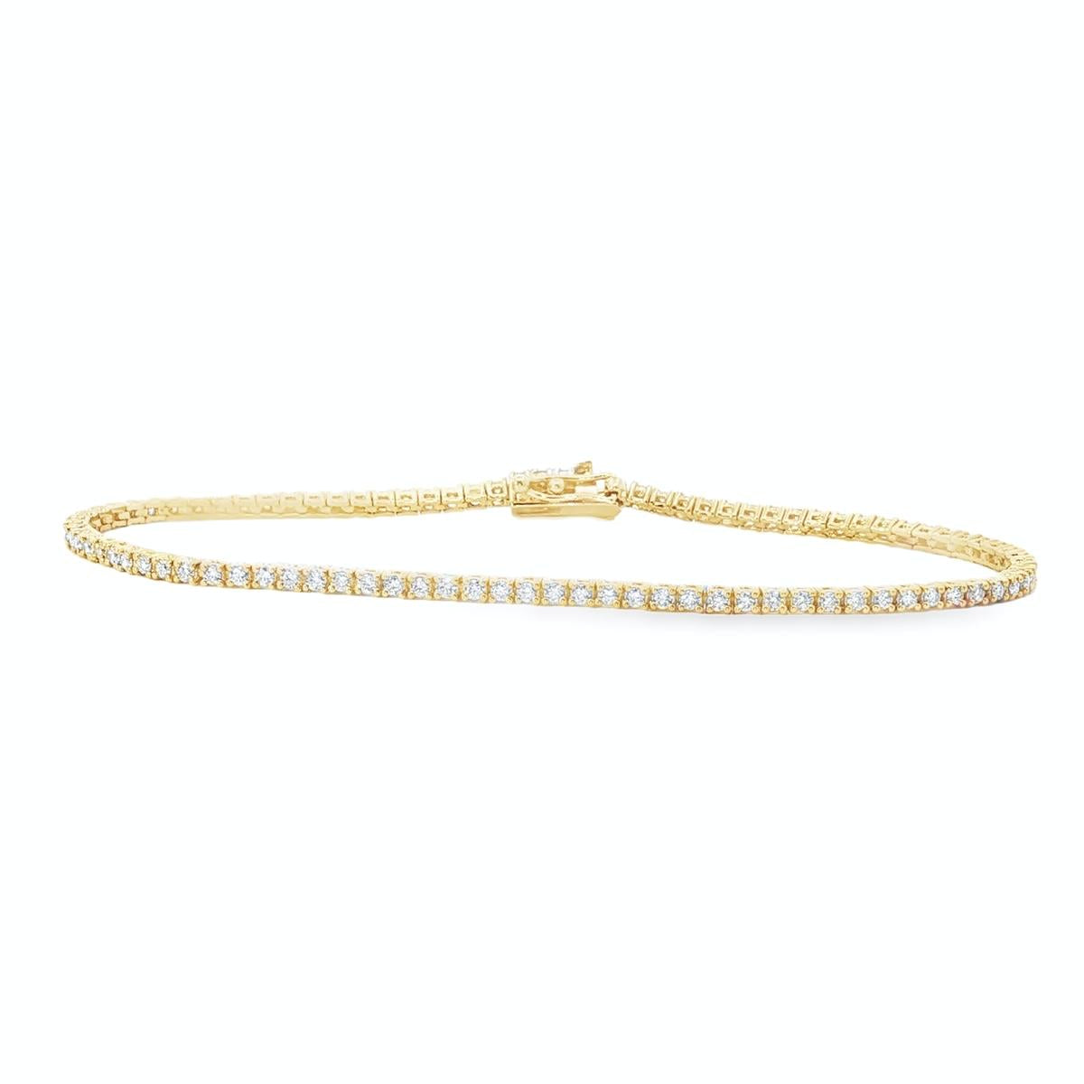 18ct yellow gold diamond tennis bracelet with fine round brilliant cut diamonds in four claw settings
