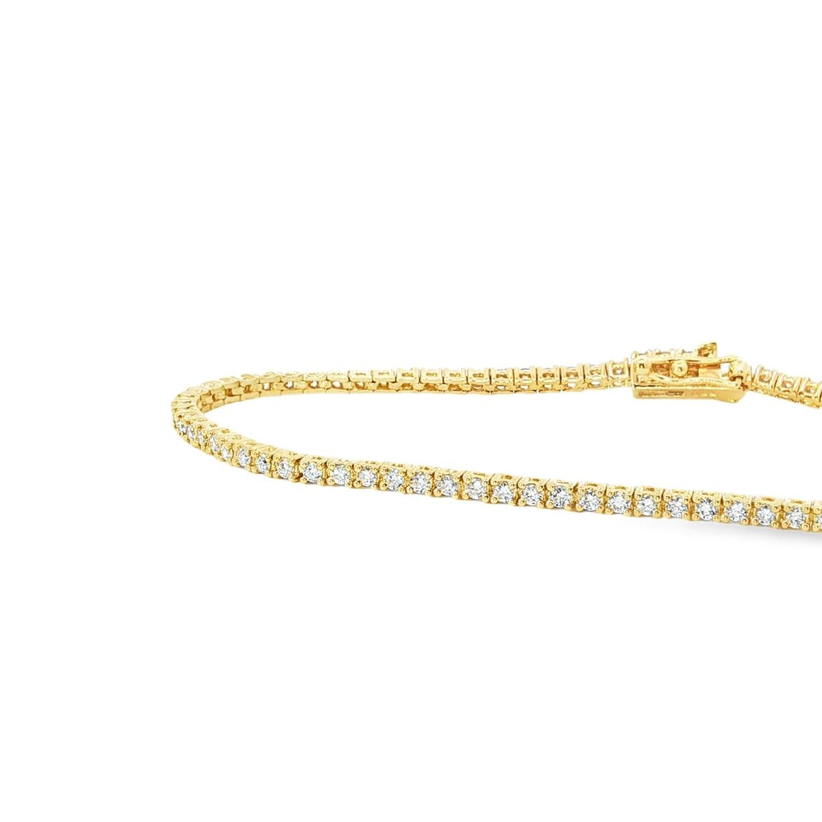 18ct yellow gold diamond tennis bracelet with fine round brilliant cut diamonds in four claw settings