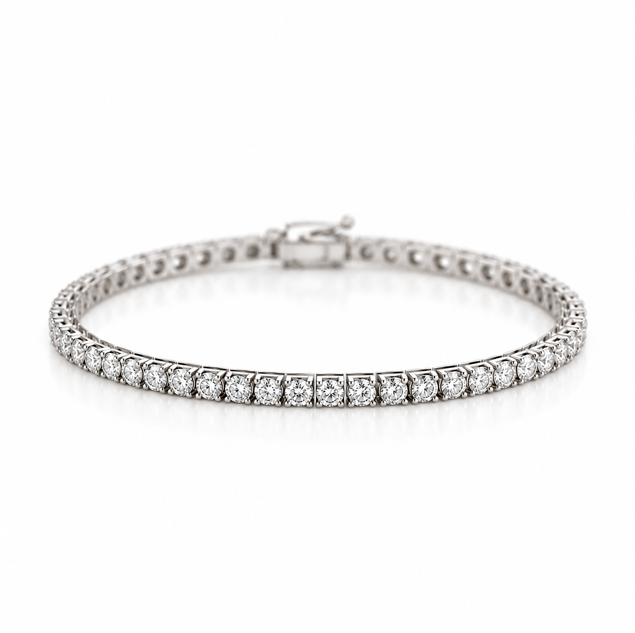 18ct white gold diamond tennis bracelet featuring 50 round brilliant cut diamonds totalling 2.50ct in classic four-claw settings.