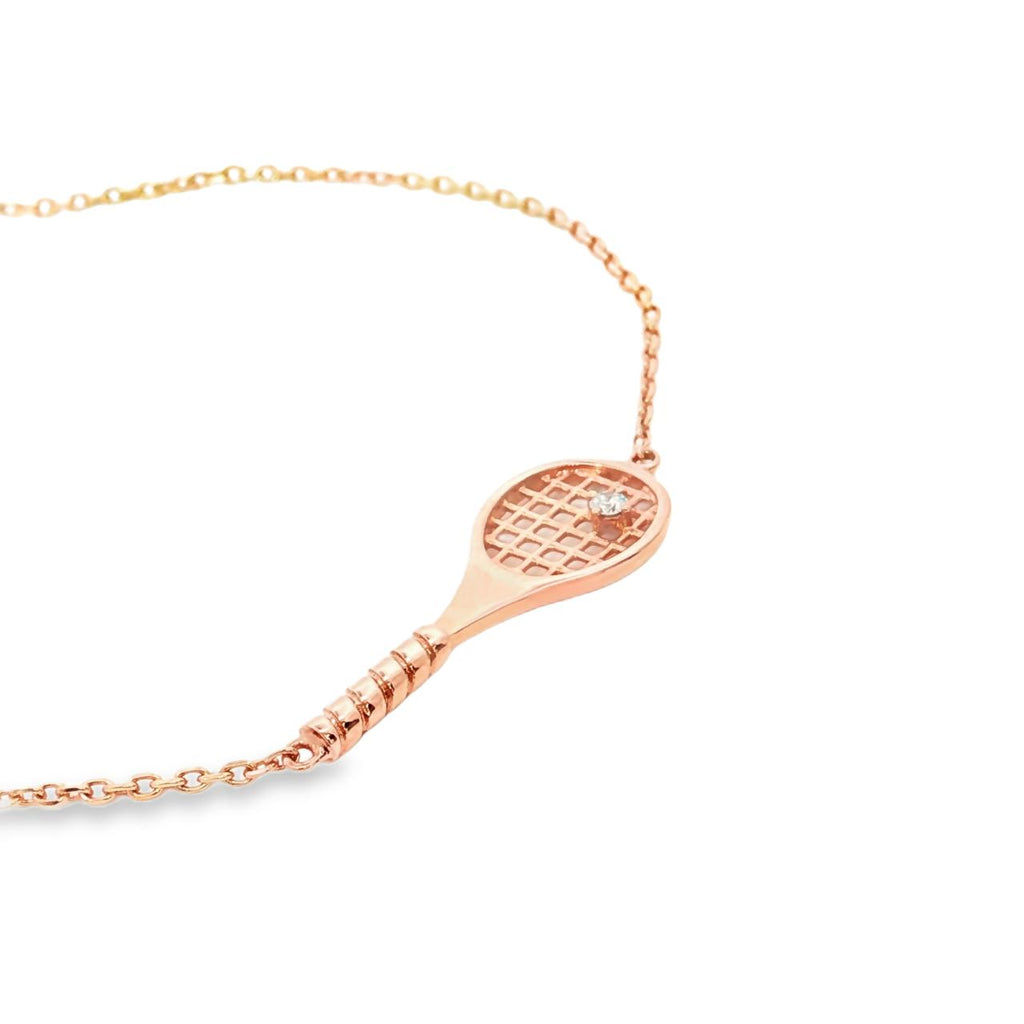 14ct rose gold diamond tennis bracelet featuring a fine adjustable trace link chain and a central tennis racquet charm set with a 0.03ct round brilliant cut diamond.
