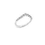 18ct white gold diamond ring featuring a curved design with graduated round settings and bead detailing.