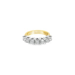 18ct yellow and white gold ring featuring seven round brilliant cut diamonds totalling 1.38ct in a shared claw setting with curved undercarriage.