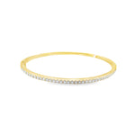 18ct yellow gold diamond bangle featuring thirty-six claw-set round brilliant cut diamonds across the top, with a hinged oval profile and secure clasp.