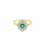 9ct yellow and white gold emerald and diamond ring featuring a round emerald surrounded by eight diamonds in a classic posy-style floral cluster design.