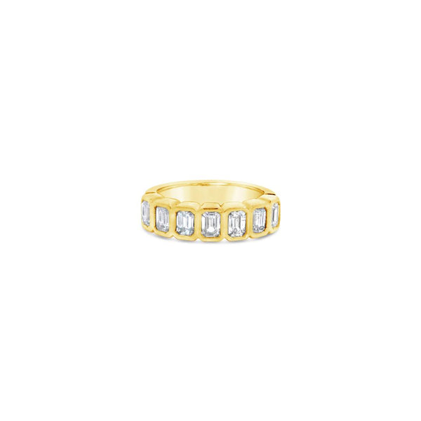 18ct yellow gold diamond ring featuring seven emerald cut diamonds in a straight row bezel setting across the top.