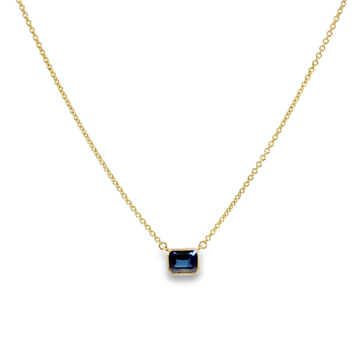 18ct yellow gold necklace with emerald cut sapphire set horizontally in bezel