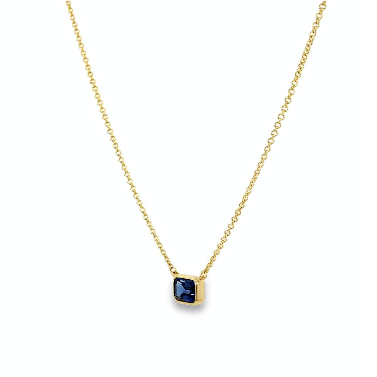 18ct yellow gold necklace with emerald cut sapphire set horizontally in bezel