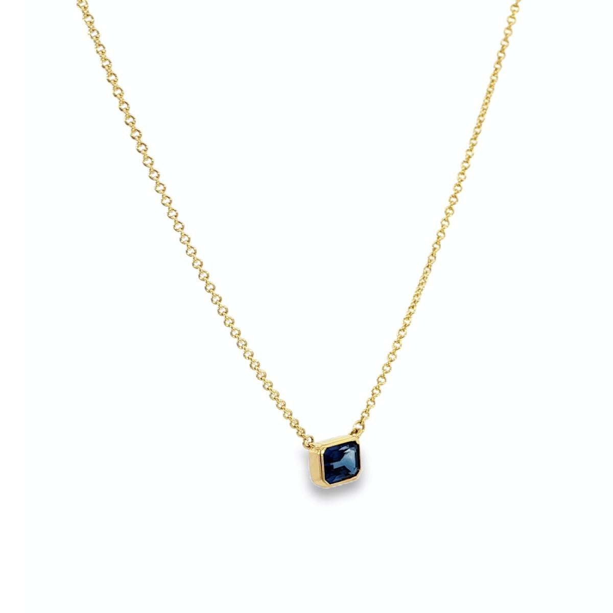 18ct yellow gold necklace with emerald cut sapphire set horizontally in bezel