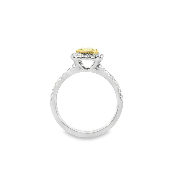 Two-tone 18ct yellow and white gold diamond ring with a 1.01ct Fancy Intense Yellow centre diamond and diamond cluster surround.