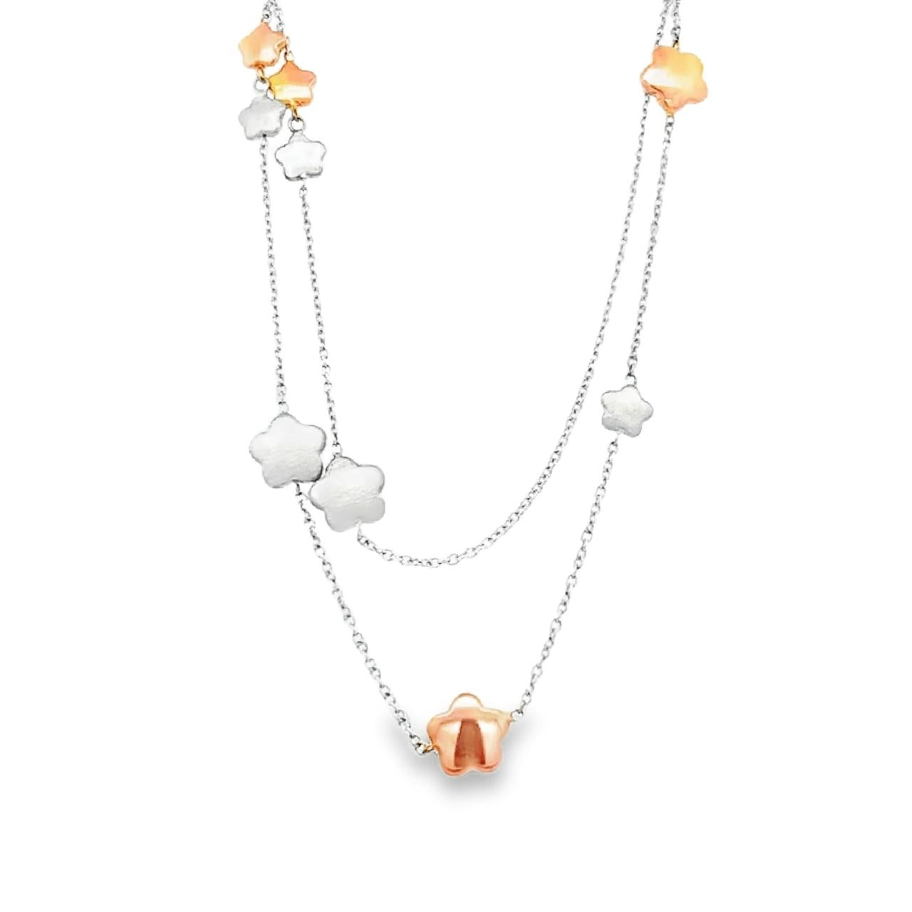 9ct white and rose gold necklet featuring alternating polished and brushed flower and star-shaped discs spaced along a 66cm trace chain.