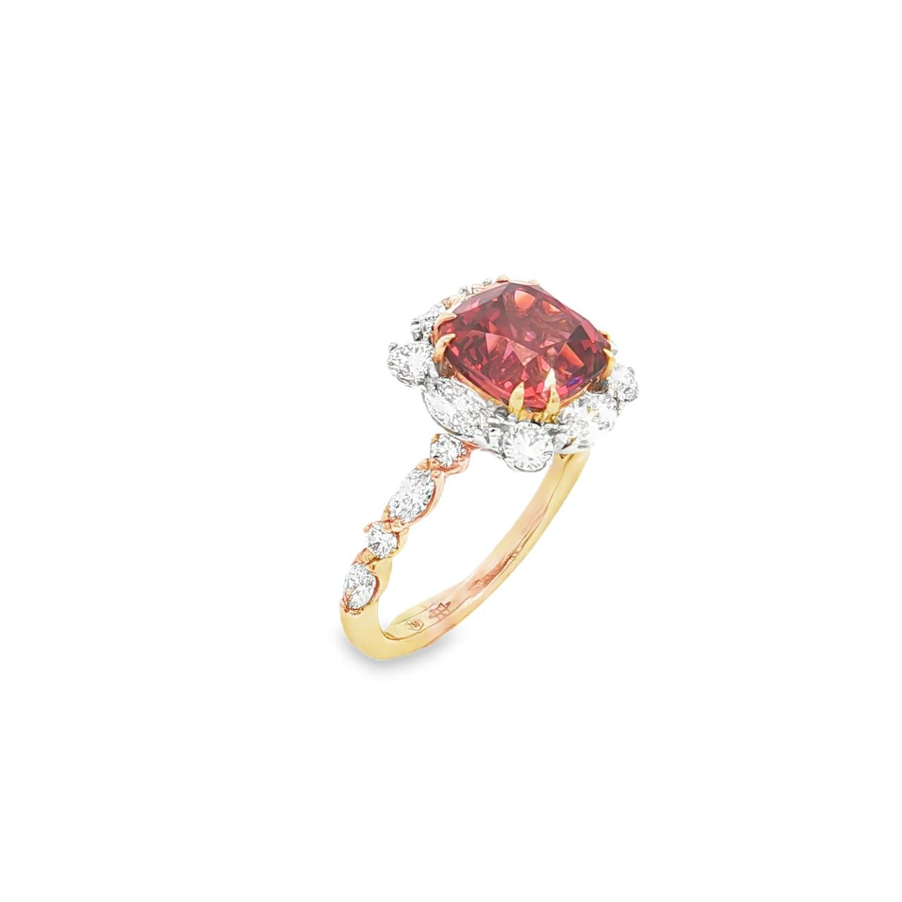18ct rose gold ring featuring a 4.55ct cushion Malaya garnet with alternating marquise and round diamond clusters surrounding the centre stone and along the shoulders.