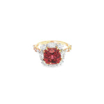 18ct rose gold ring featuring a 4.55ct cushion Malaya garnet with alternating marquise and round diamond clusters surrounding the centre stone and along the shoulders.