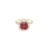 18ct rose gold ring featuring a 4.55ct cushion Malaya garnet with alternating marquise and round diamond clusters surrounding the centre stone and along the shoulders.