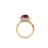 18ct rose gold ring featuring a 4.55ct cushion Malaya garnet with alternating marquise and round diamond clusters surrounding the centre stone and along the shoulders.