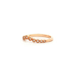 Graduating diamond curved band in rose gold