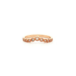 Graduating diamond curved band in rose gold