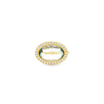18ct yellow gold ring featuring a 4.13ct oval cabochon green quartz in a horizontal bezel setting with a diamond halo cluster in white gold.