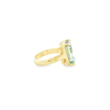9ct yellow gold ring featuring a 14 x 10mm emerald cut green quartz in a four-claw setting with engraved shoulders.