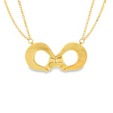 18ct yellow gold necklet featuring a polished interlocking centrepiece on a double trace link chain, elegant modern gold design.