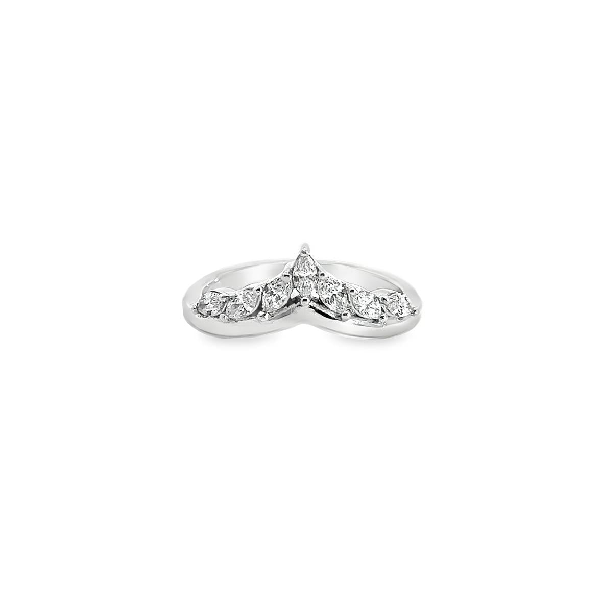 18ct white gold tiara-style ring featuring seven marquise cut diamonds totalling 0.33ct, claw set to form a delicate pointed crown shape.