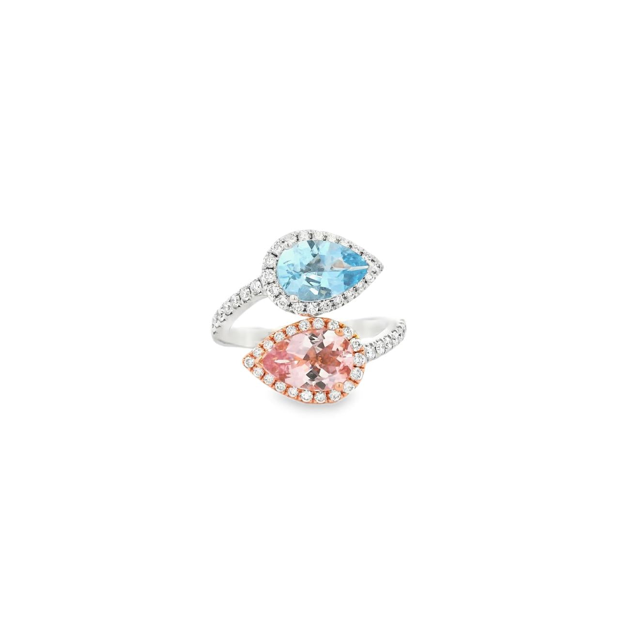 18ct white and rose gold ring featuring a cross-over design with pear-cut morganite and aquamarine gemstones surrounded by diamond halos and claw-set diamond shoulders.