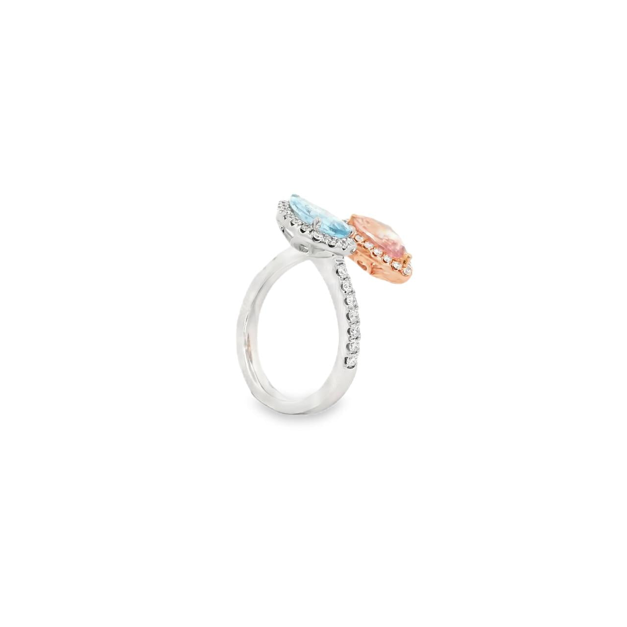 18ct white and rose gold ring featuring a cross-over design with pear-cut morganite and aquamarine gemstones surrounded by diamond halos and claw-set diamond shoulders.
