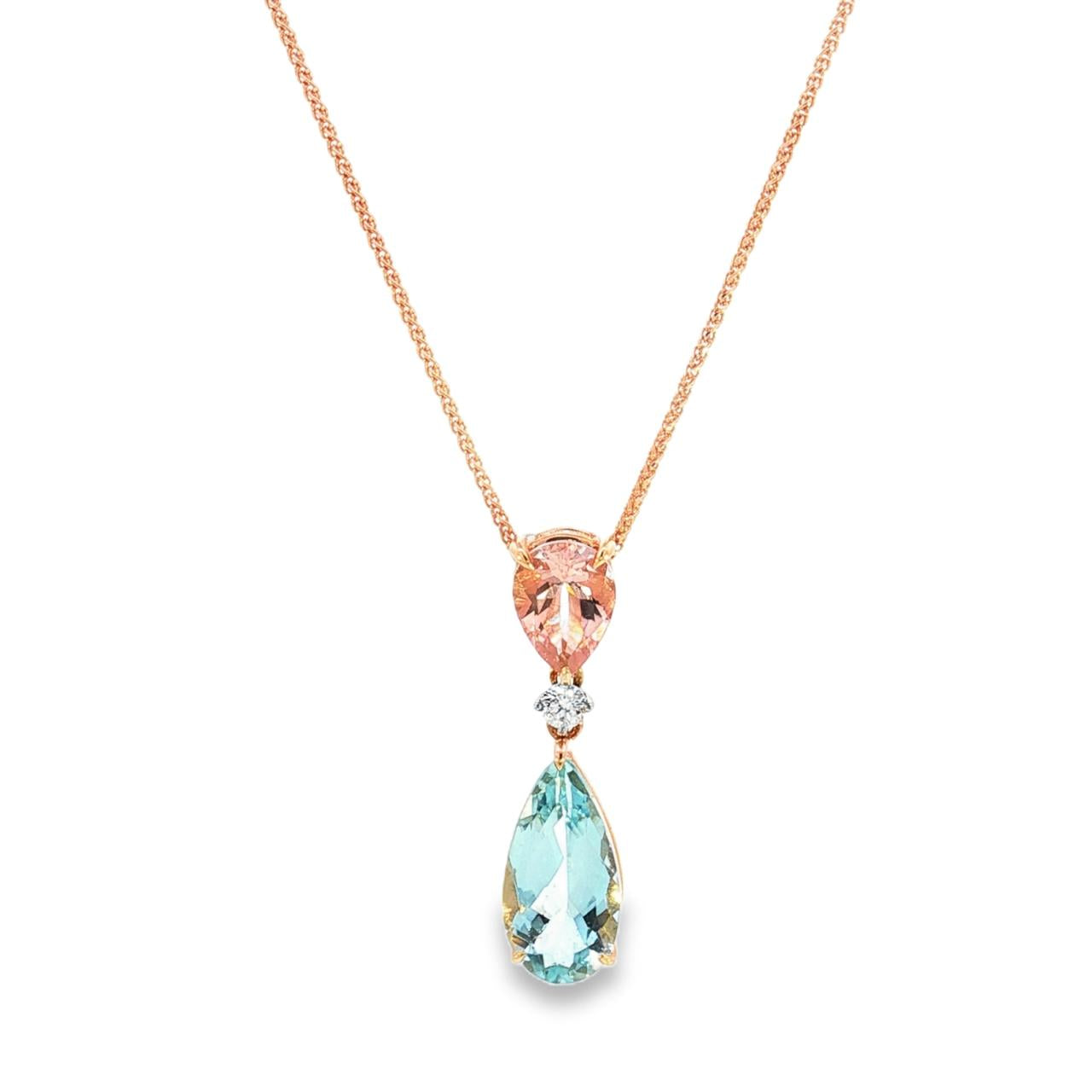 18ct rose and white gold pendant featuring pear-cut morganite and aquamarine with a central diamond accent and concealed pendant runner.