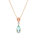 18ct rose and white gold pendant featuring pear-cut morganite and aquamarine with a central diamond accent and concealed pendant runner.