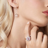 18ct rose gold morganite and diamond drop earrings featuring cushion cut morganites with diamond halos and continental clasps.