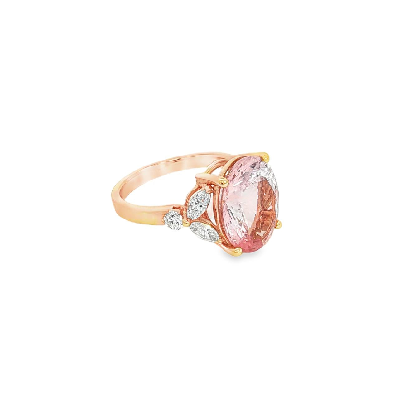 18ct rose gold ring featuring a 5.12ct oval morganite in a four-claw setting with marquise and round diamond accents and a post and bezel undercarriage.